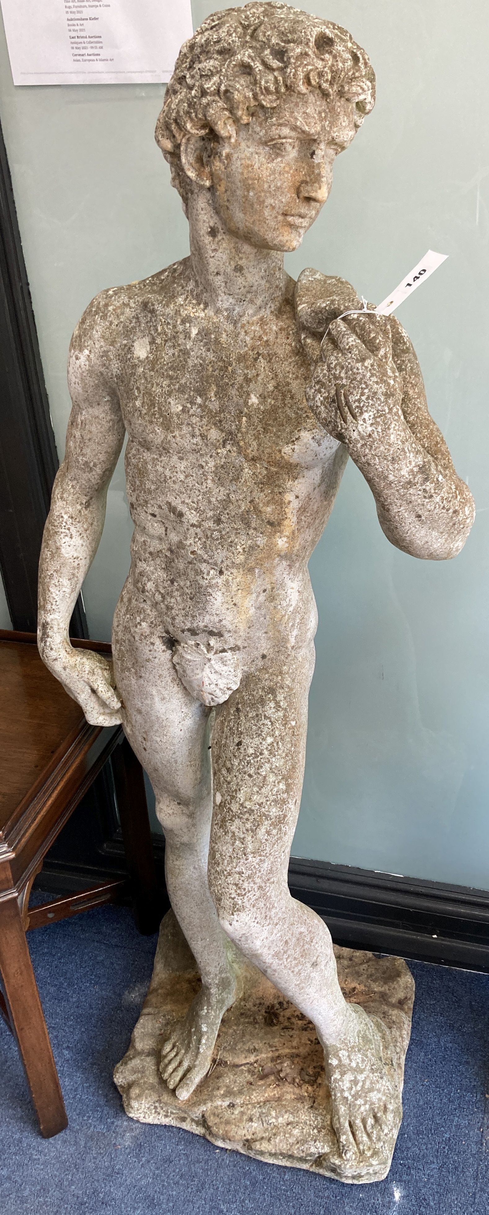 A reconstituted stone garden ornament of David, height 130cm